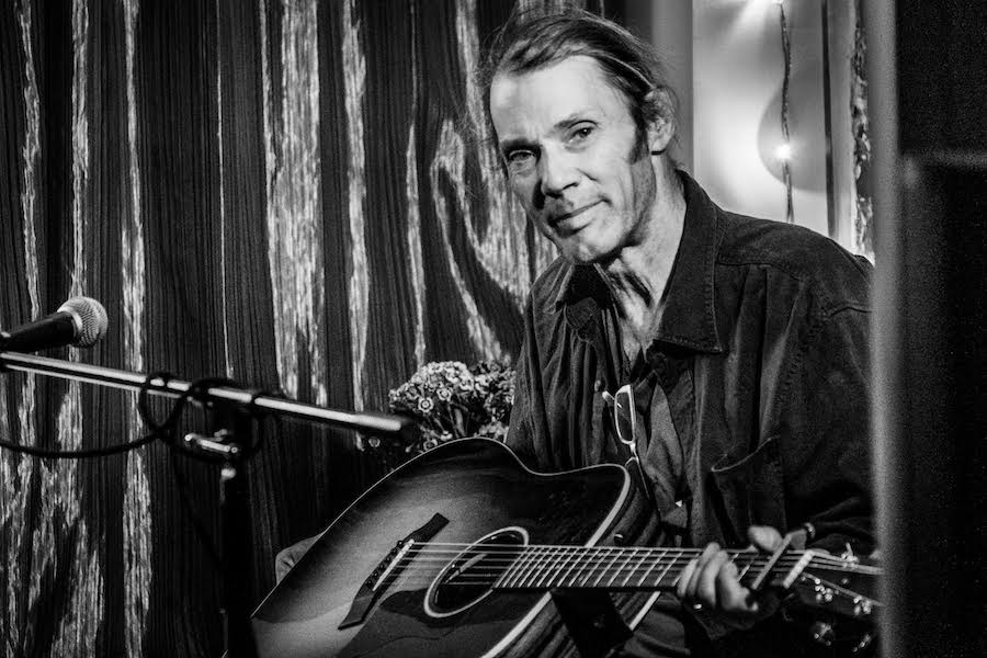 VIDEO PREMIERE: Malcolm Holcombe Offers Sweet Harmonies and Rootsy Folk to Bleak Lyrics on “New Damnation Alley”