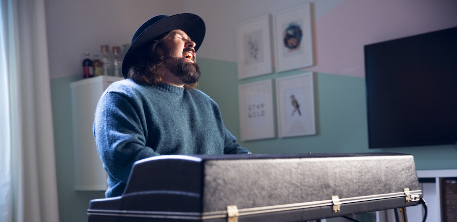 VIDEO PREMIERE: Dan Moxon Dwells on the Mundane with Bouncy, 70s Style Piano Rock Tune “Playing With Fire”