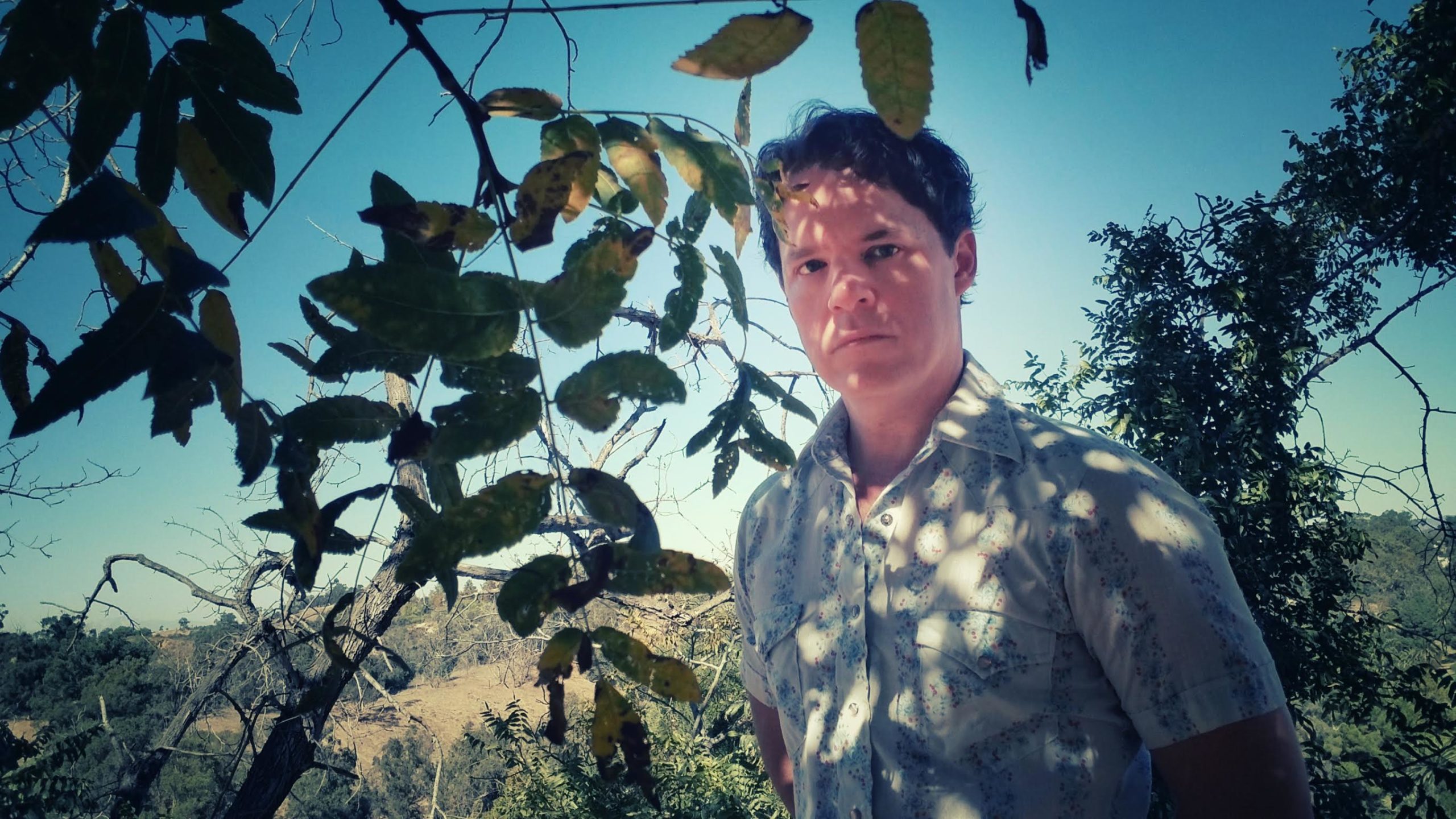 VIDEO PREMIERE: Gregg Garvey Wanders Through a Dreamlike Memory with Baroque Americana Tune “Minot”