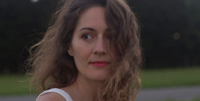 LISTEN: Lena Minder Delivers Haunting & Delicately Constructed Songcraft Via  “Stay Around”