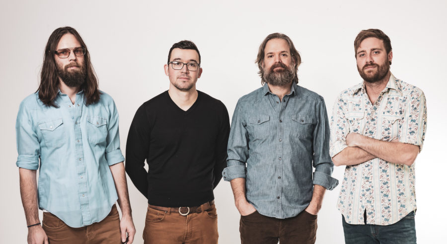 SONG PREMIERE: Arkansauce Let Strong Bluegrass Chops Shine on “Up on the Shelf”