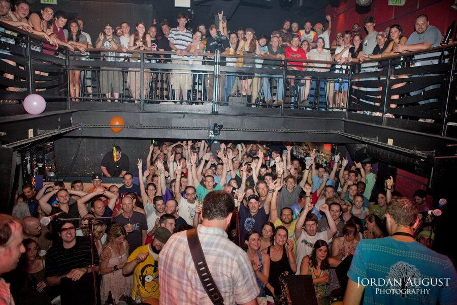 For Forty Plus Years, Baltimore’s 8×10 Serves Up Rising Acts In Intimate Confines  (THESE WALLS)