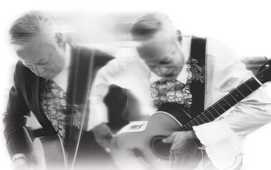 VIDEO PREMIERE: Tommy Emmanuel & Raul Malo Create Tuneful Magic On Standard “Far Away Places”