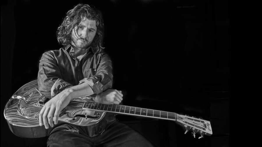 VIDEO PREMIERE: Dom Martin Unleashes Driving Slide Guitar Sounds on “Belfast Blues”