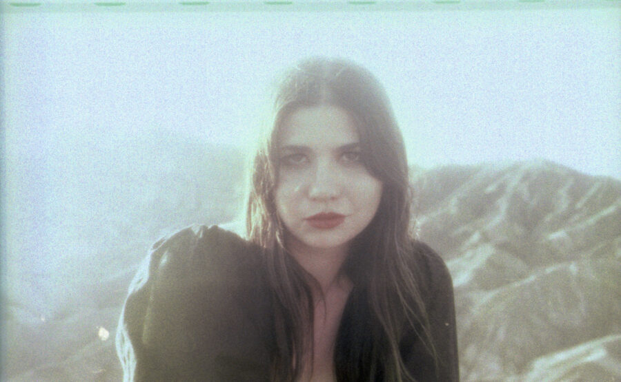 LISTEN: Pearl Charles Captures Ethereal Folk With Psychedelic Undertones On “Does This Song Sound Familiar?”